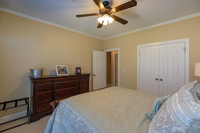 8301 Wynlakes Blvd, Montgomery, AL 36117 - bedroom with a closet, crown molding, a ceiling fan, and carpet floors