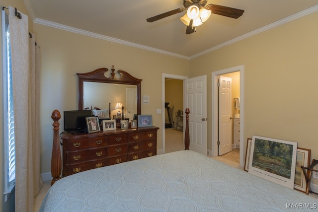 carpeted bedroom featuring ceiling fan, crown molding, and ensuite bath