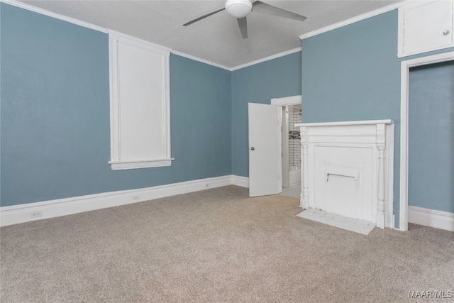 interior space with ceiling fan, ornamental molding, a textured ceiling, a closet, and light carpet