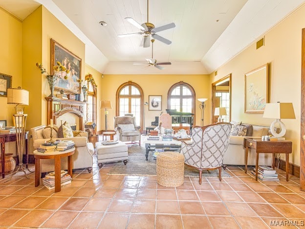 living room featuring tile patterned floors and ceiling fan