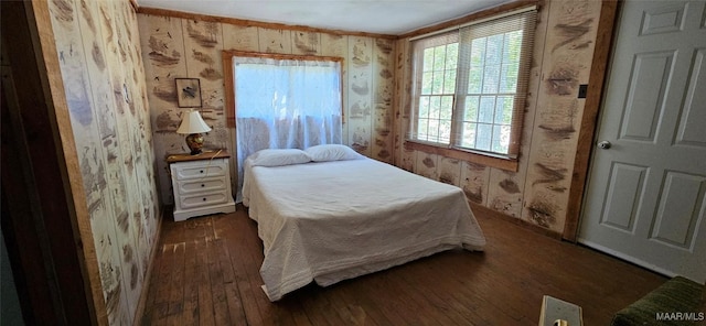 bedroom featuring dark wood-style floors