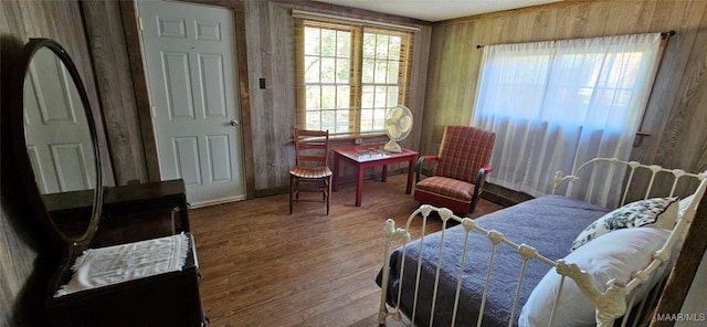 bedroom featuring wood finished floors