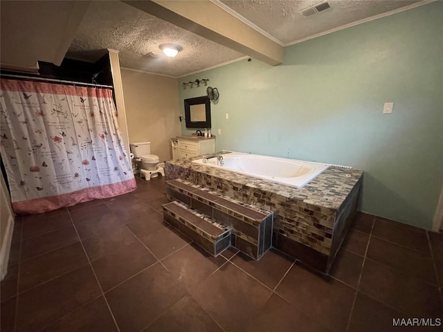 bathroom featuring tile patterned flooring, toilet, crown molding, a bath, and a textured ceiling