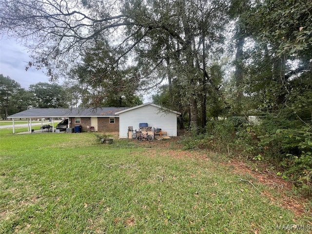 view of yard with a carport