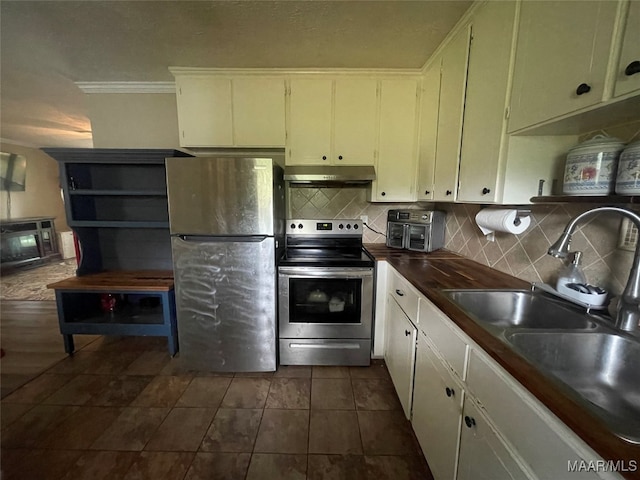 kitchen with tasteful backsplash, sink, ornamental molding, white cabinetry, and appliances with stainless steel finishes