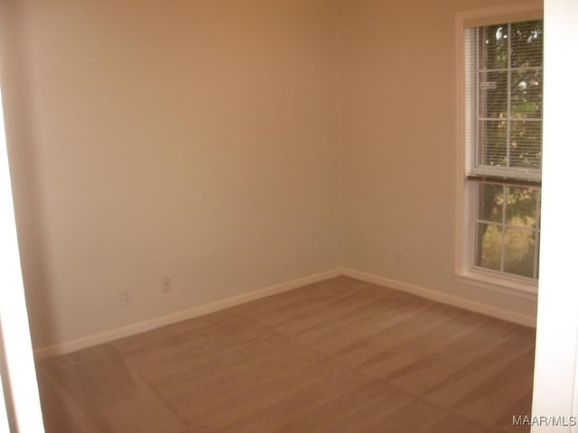 unfurnished room with hardwood / wood-style floors