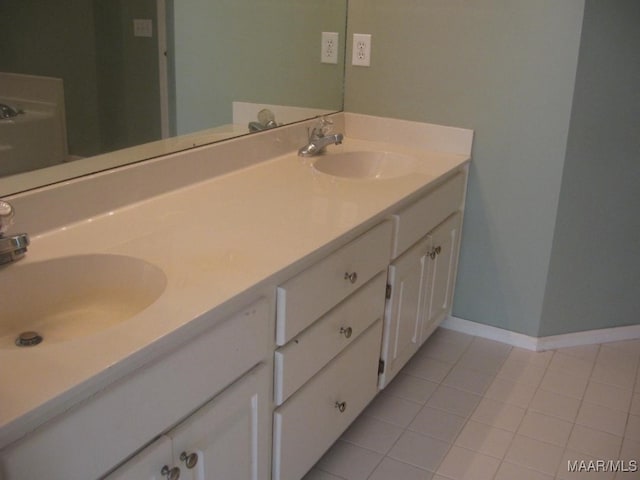 bathroom with vanity and tile patterned floors