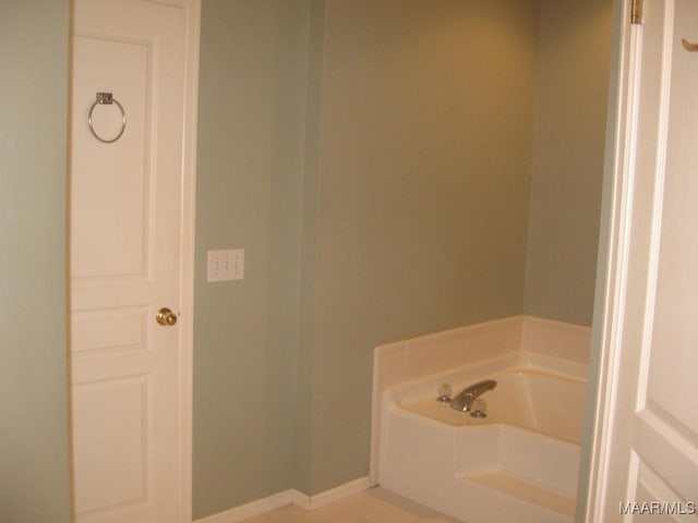 bathroom with a washtub