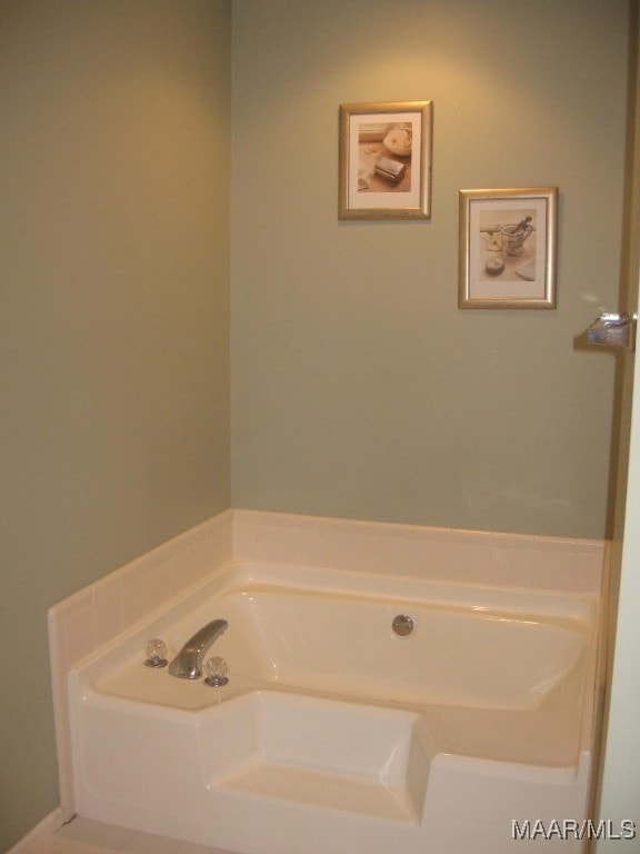 bathroom with a bathing tub