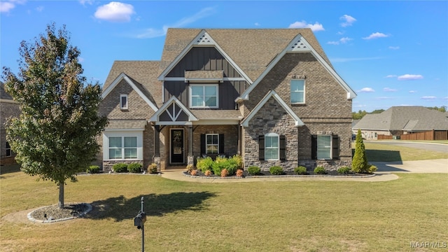 craftsman house with a front yard