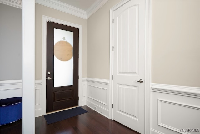 entryway with dark wood-type flooring and ornamental molding