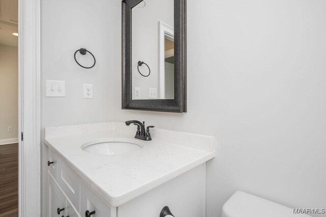 78 Hillston Dr, Wetumpka, AL 36093 - bathroom with vanity, toilet, and wood finished floors