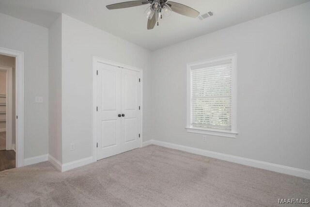 78 Hillston Dr, Wetumpka, AL 36093 - unfurnished bedroom featuring carpet floors, baseboards, a closet, and ceiling fan
