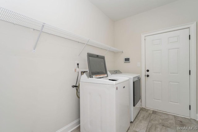 78 Hillston Dr, Wetumpka, AL 36093 - clothes washing area with independent washer and dryer and baseboards