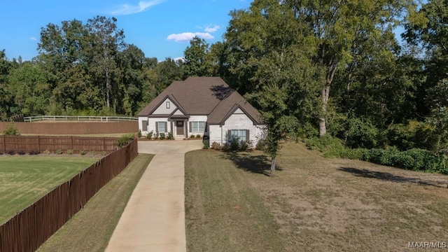 view of front of home with a front yard