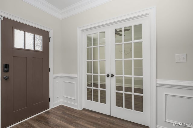 foyer featuring french doors, crown molding, and dark hardwood / wood-style flooring