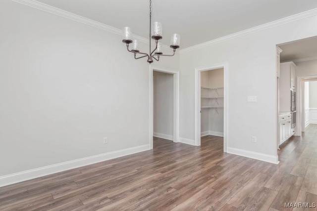 78 Hillston Dr, Wetumpka, AL 36093 - unfurnished dining area featuring a chandelier, wood finished floors, ornamental molding, and baseboards