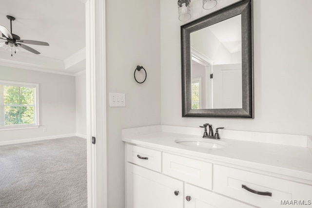 bathroom featuring crown molding and vanity