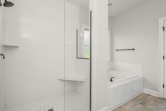 78 Hillston Dr, Wetumpka, AL 36093 - full bath featuring a stall shower, a garden tub, and baseboards