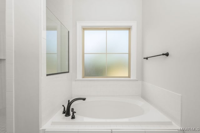 bathroom featuring a tub