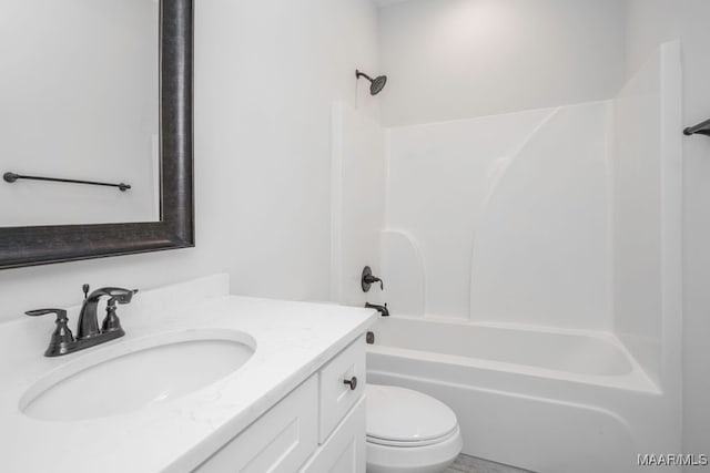 full bathroom with toilet, washtub / shower combination, and vanity