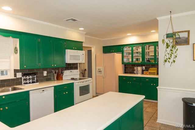 kitchen featuring white appliances, sink, crown molding, light tile patterned floors, and backsplash