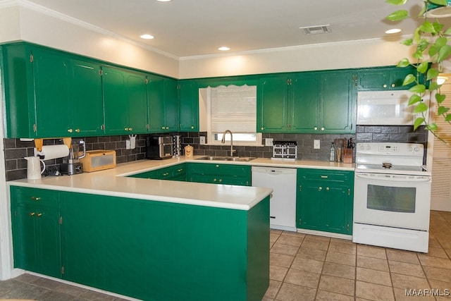 kitchen featuring light tile patterned flooring, white appliances, crown molding, sink, and kitchen peninsula