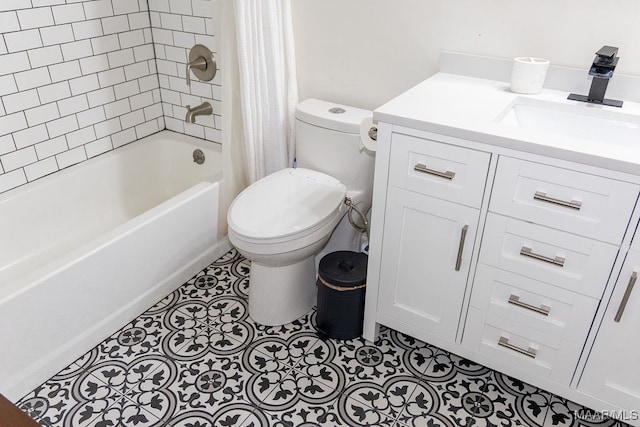 full bathroom featuring shower / bathtub combination with curtain, tile patterned floors, vanity, and toilet