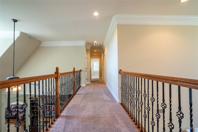 hall with crown molding and carpet floors