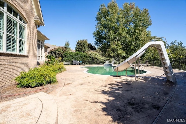 156 Walnut Point Dr, Wetumpka, AL 36093 - view of pool with a water slide, a patio, and a fenced in pool