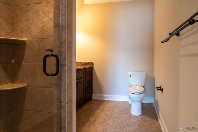 156 Walnut Point Dr, Wetumpka, AL 36093 - bathroom with vanity, tile patterned floors, toilet, a stall shower, and baseboards