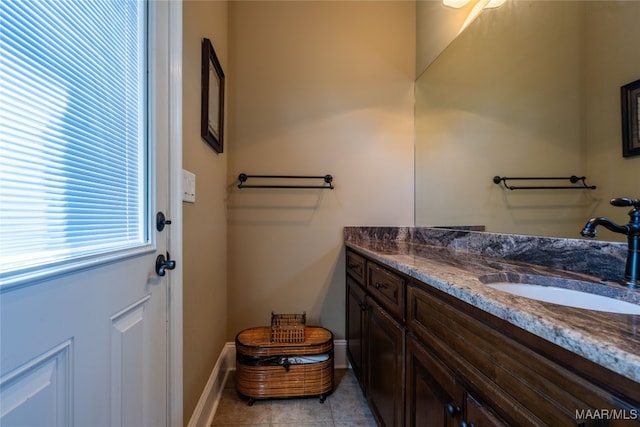 bathroom with vanity and tile patterned flooring