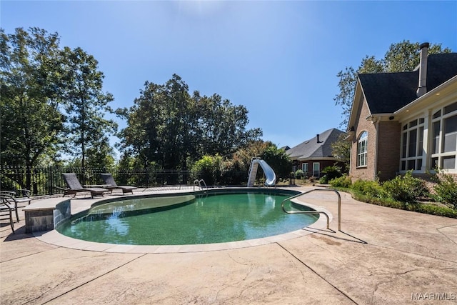156 Walnut Point Dr, Wetumpka, AL 36093 - view of pool featuring fence, a water slide, a patio, and a fenced in pool