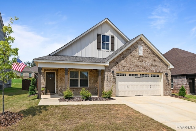 craftsman-style home featuring a front lawn, covered porch, and a garage