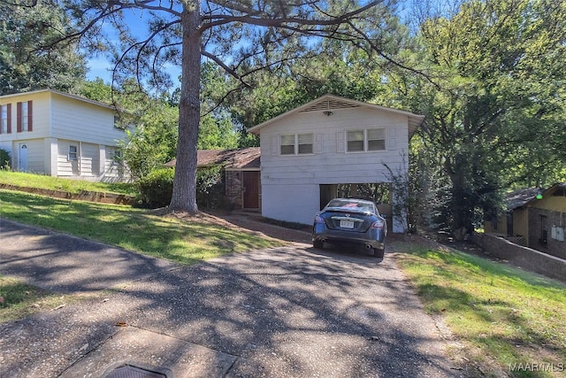 view of property exterior featuring a carport and a lawn