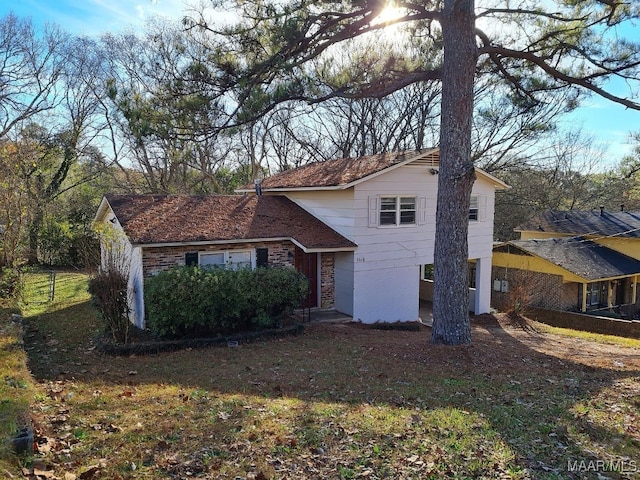 view of front of property featuring brick siding