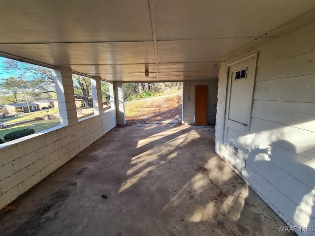 view of patio / terrace with a carport