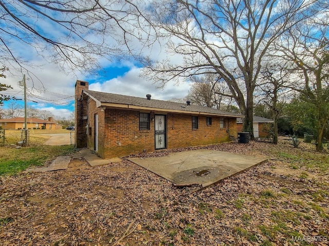 back of property featuring a patio