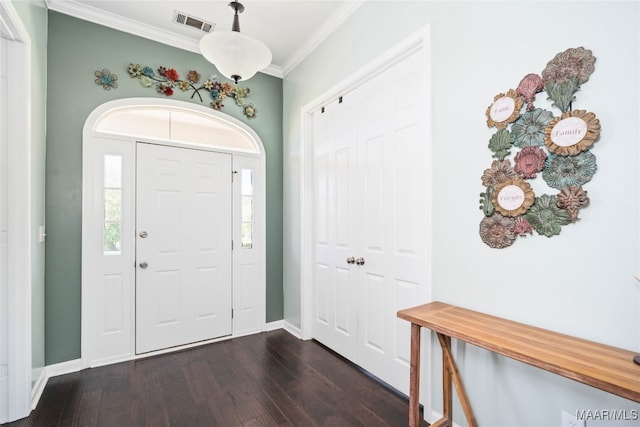 entryway with crown molding and dark wood-type flooring