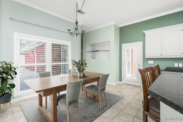 dining area featuring a chandelier, light tile patterned floors, a wealth of natural light, and crown molding