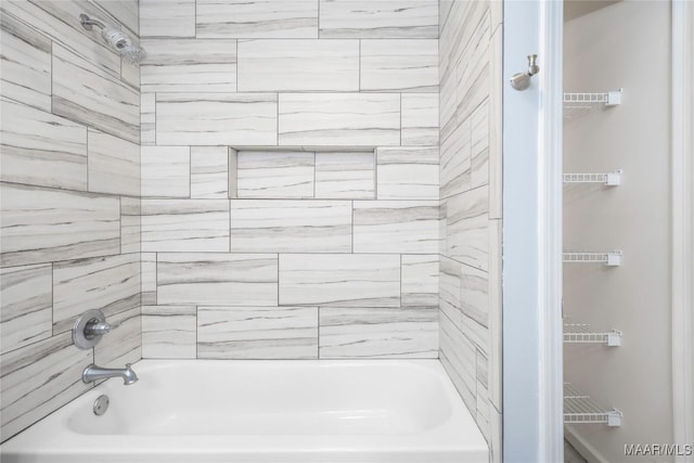 bathroom with shower / washtub combination