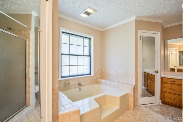 full bathroom featuring a textured ceiling, independent shower and bath, toilet, vanity, and ornamental molding