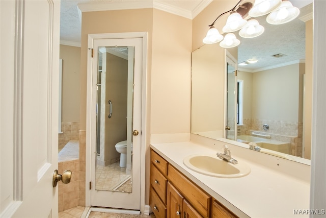 bathroom with vanity, crown molding, toilet, and tile patterned floors