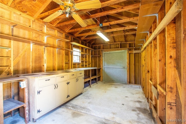 interior space featuring ceiling fan