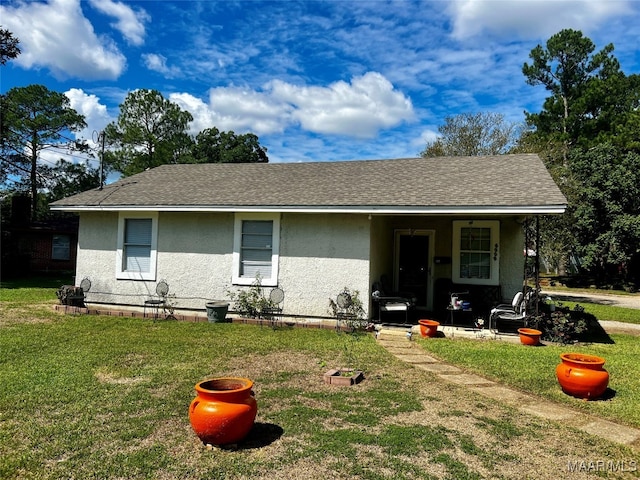 view of front of home with a front yard