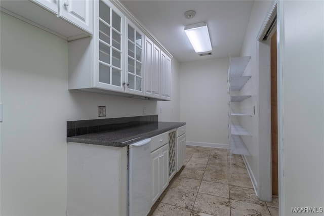 kitchen with white cabinetry