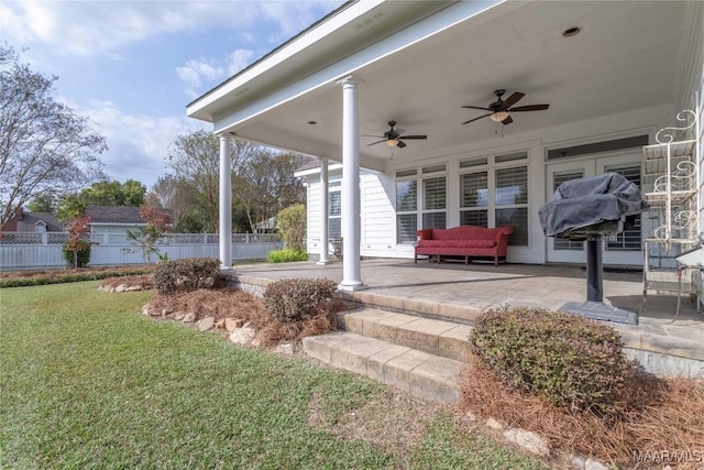 view of patio / terrace featuring ceiling fan