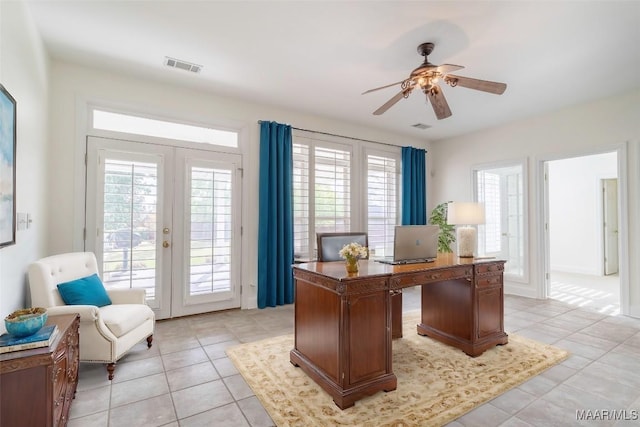 office area featuring ceiling fan, french doors, a healthy amount of sunlight, and light tile patterned flooring