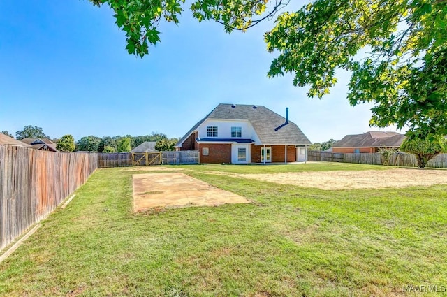 200 Mcrae Rd, Deatsville, AL 36022 - back of property with a patio and brick siding