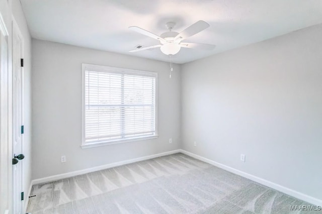200 Mcrae Rd, Deatsville, AL 36022 - empty room with baseboards, light carpet, and ceiling fan